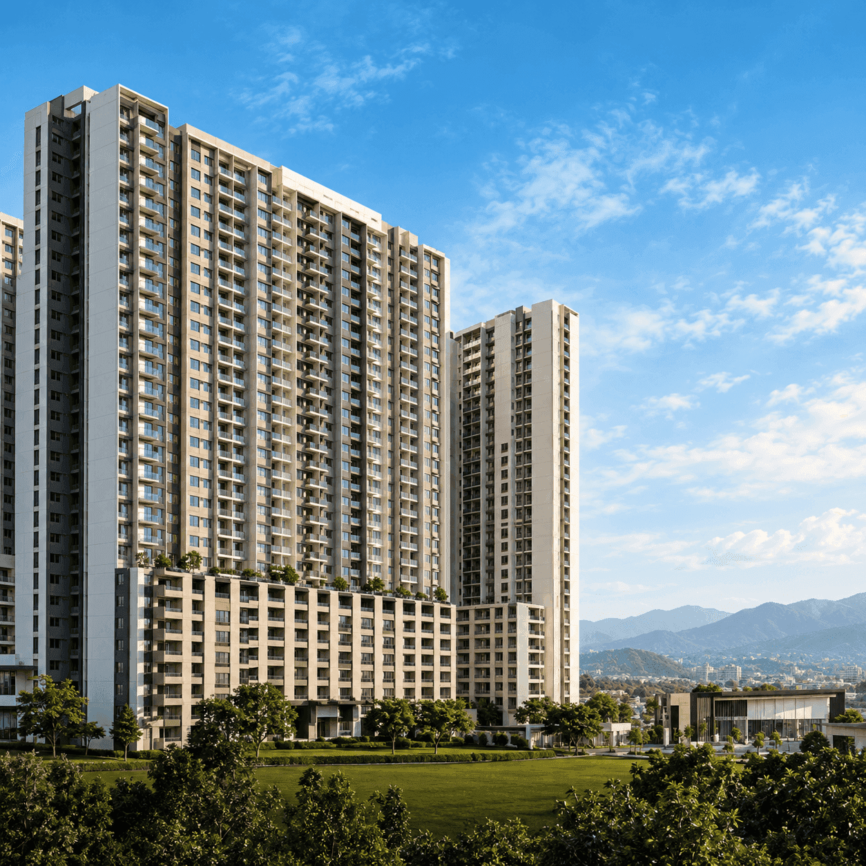 RUMAWIP Taman Melati residential towers with mountain views under a blue sky