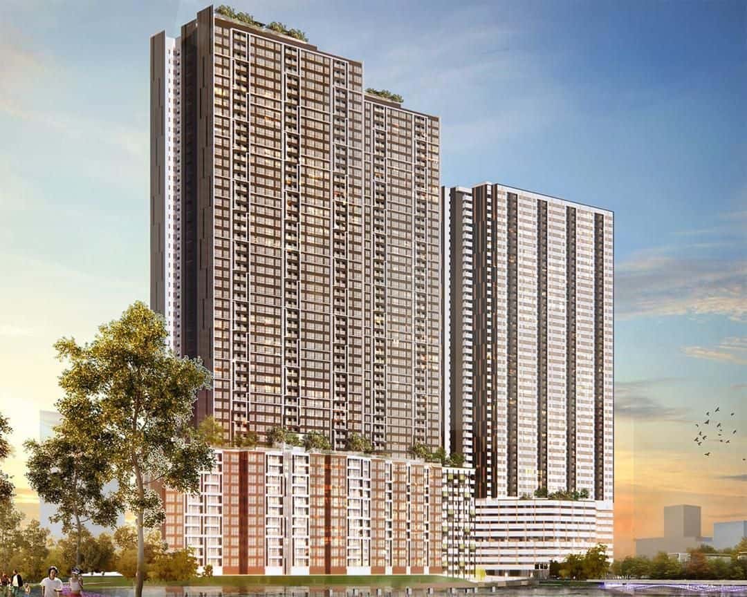 RUMAWIP Tepian Tasik residential towers and podium in warm evening light