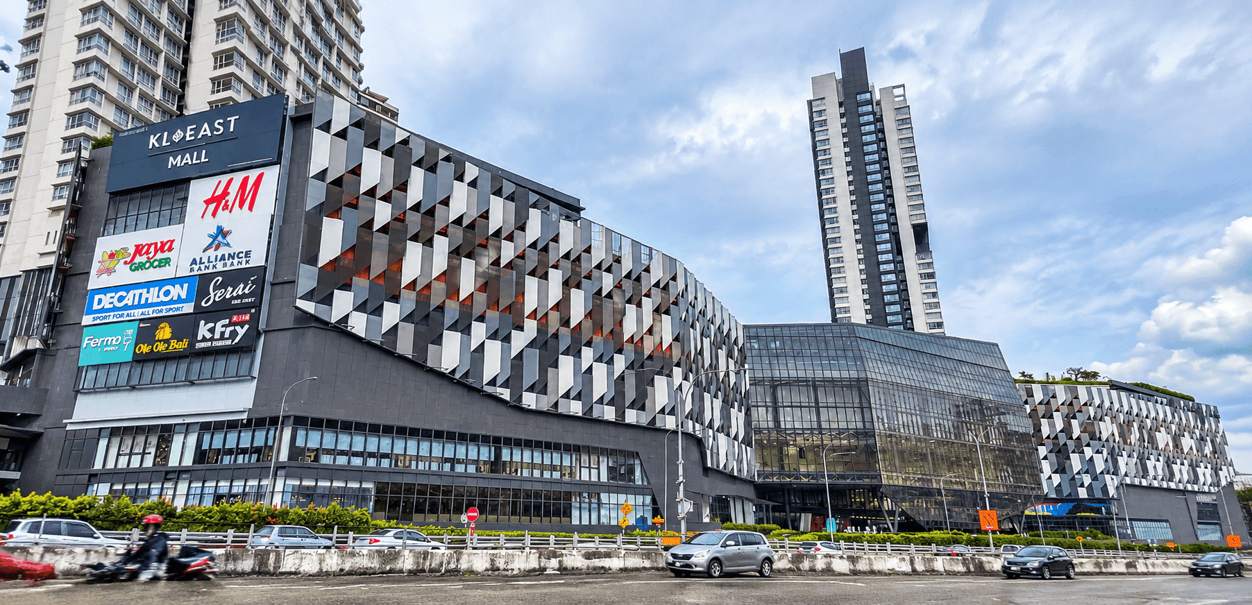 KL East Mall's patterned facade in Taman Melati, Kuala Lumpur, with residential towers rising behind it