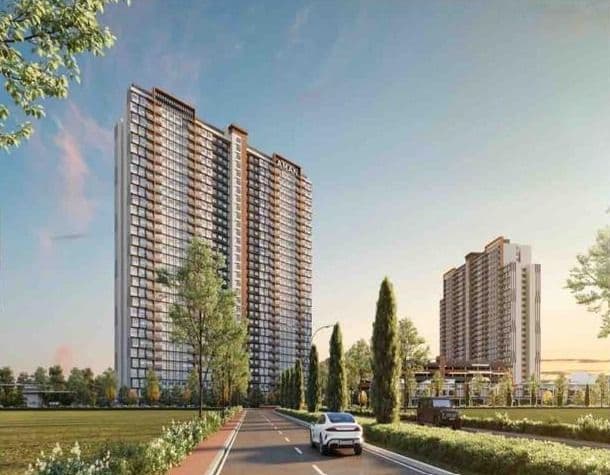 RSKU Bandar Bukit Raja apartment towers beside a landscaped entrance road