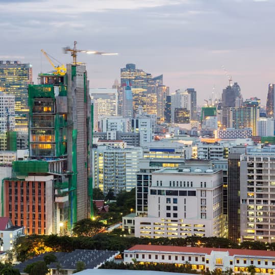Klang Valley skyline with the Petronas Twin Towers under a blue sky