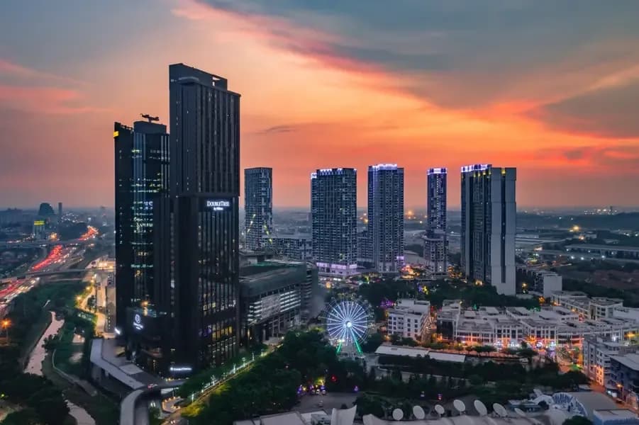 Shah Alam's i-City skyline at sunset, with the DoubleTree by Hilton tower, residential towers and the i-City Ferris wheel