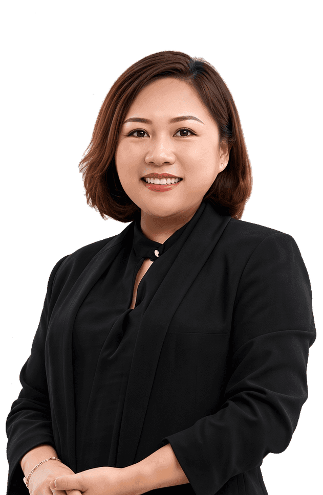 Chris Lim, a woman with shoulder-length brown hair wearing a black blazer, standing with her hands clasped